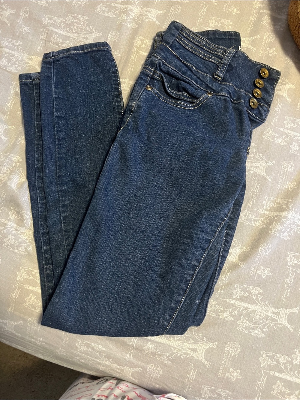 High-Rise Skinny Jeans in Dark Blue with Button Detail